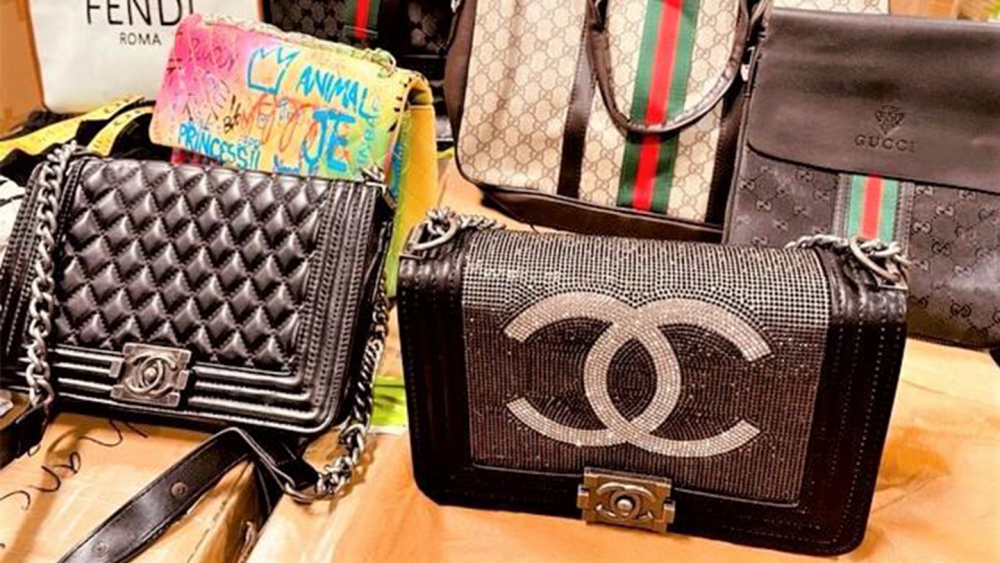 Brazen vendors selling knockoff Gucci and Louis Vuitton bags are